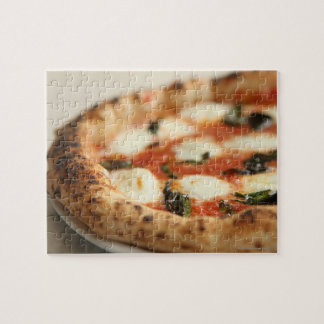 Stängning av en hel pizza paj pussel