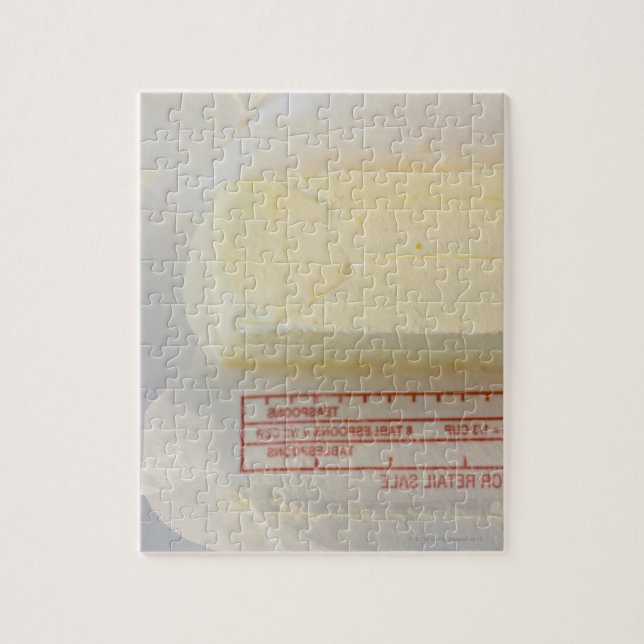 Stängning av färskt smör pussel (Vertikal)