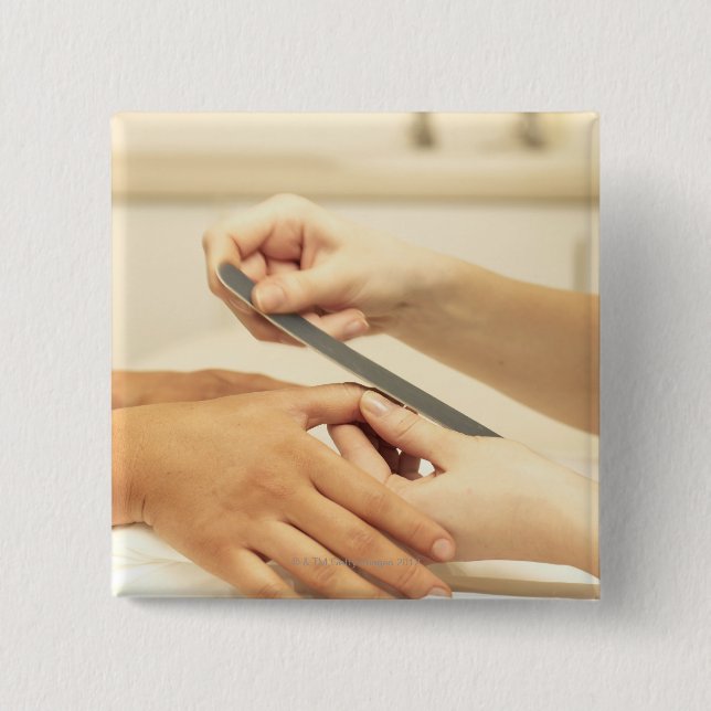 Stängning av manikyr knapp (Framsida)