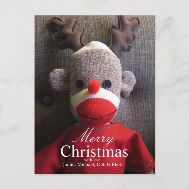 Stängning av sock monkey ansikte med kantler, rött helg vykort (Framsida)