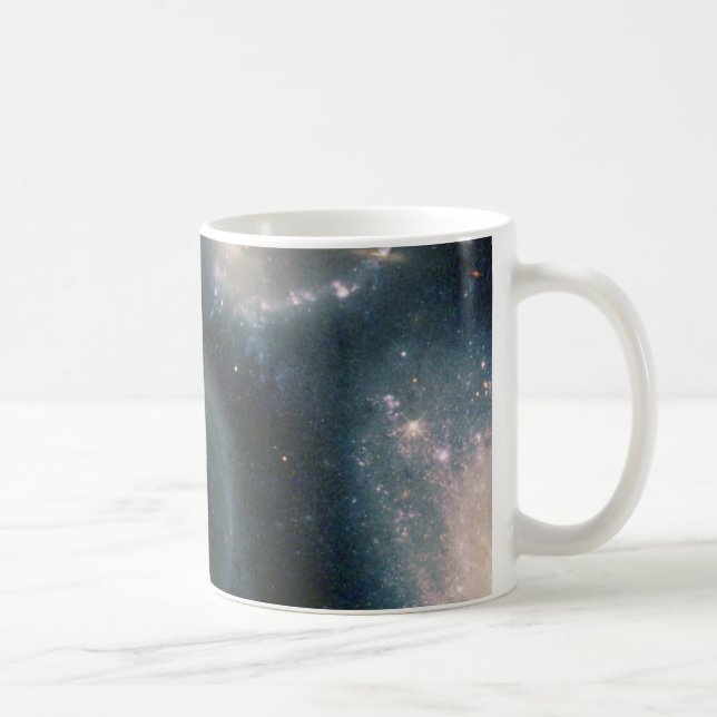 Star Clusters är född bland interagerande galaxer Kaffemugg (Höger)