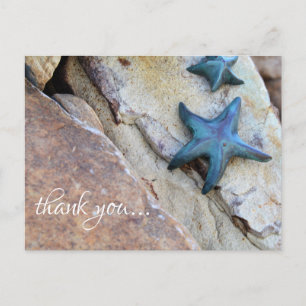 Starfish on Rocky Background Beach Tack Vykort