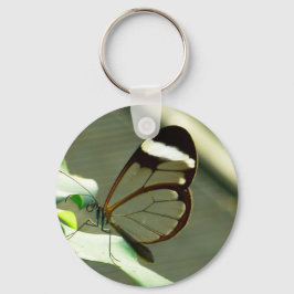 Stark brun och genomskinlig fjäril nyckelring