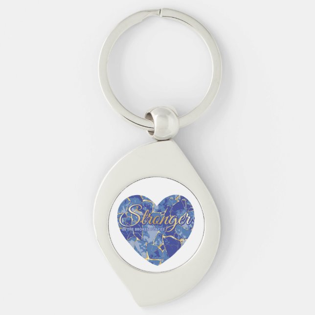 Starkare i de trasiga ställena swirl silverfärgad nyckelring (Framsidan)