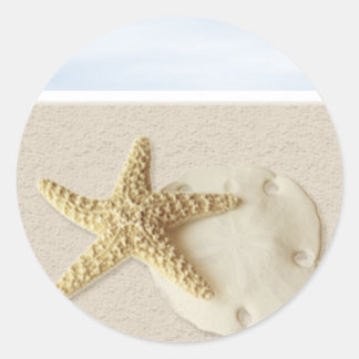 Stärkelsefisk och sanddollar runt klistermärke