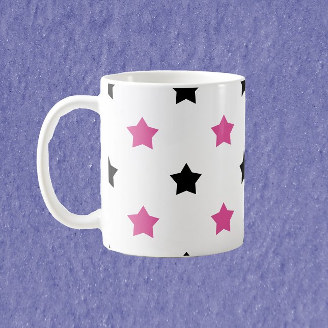 Stars Rosa och svart Mönster White-bakgrund Kaffemugg (A mug with a pattern of pink and black stars on a white background)