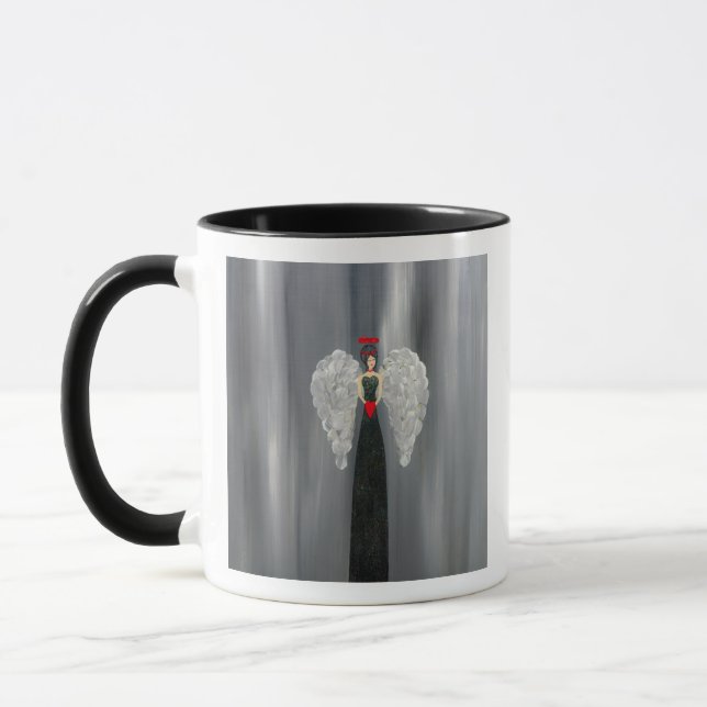 Start your day with this beautiful angel mug.  mugg (Vänster)