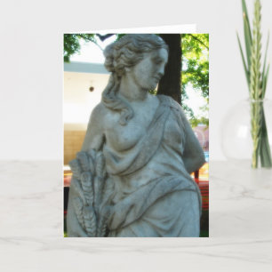 Statue dam i parken kort