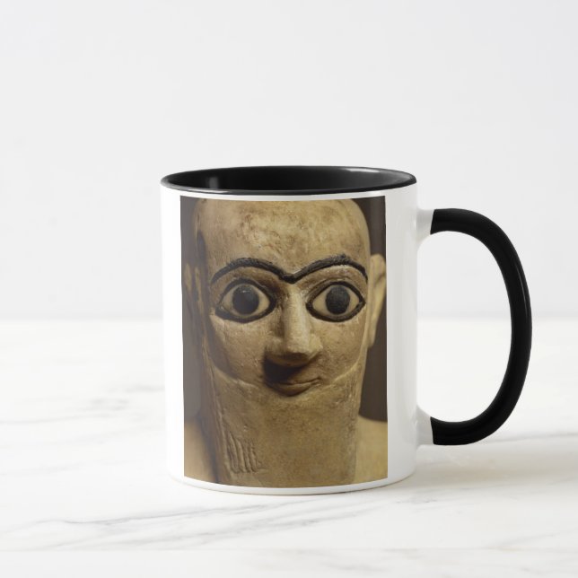 Statuette av den officiell- eller marskalkEbih-Il Mugg (Höger)