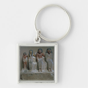 Statuette av en familjgrupp (pigmenten på krita) fyrkantig silverfärgad nyckelring