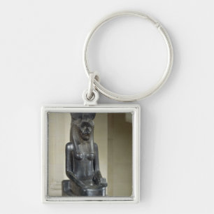 Staty av denhövdade gudinnan Sekhmet, från th Fyrkantig Silverfärgad Nyckelring