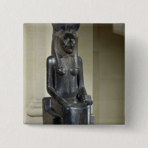 Staty av denhövdade gudinnan Sekhmet, från th Knapp