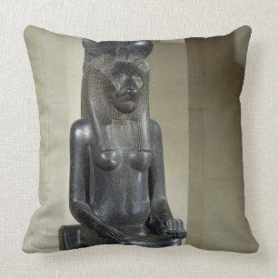 Staty av denhövdade gudinnan Sekhmet, från th Kudde