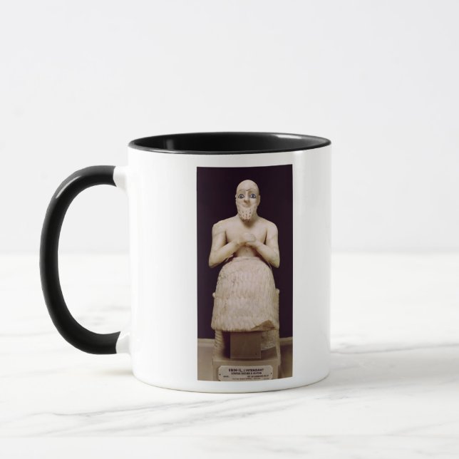 Staty av officiellen Ebih-Il Mugg (Vänster)