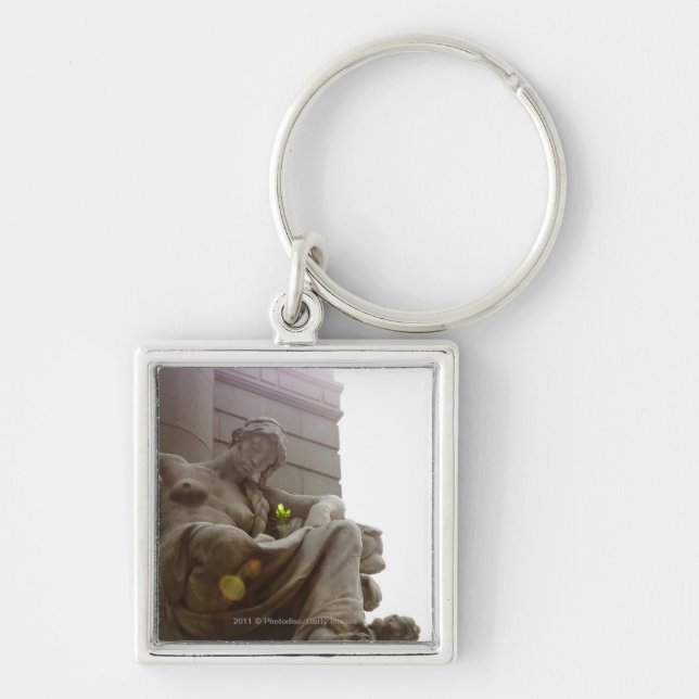 Staty för indianmedborgaremuseum fyrkantig silverfärgad nyckelring (Framsidan)