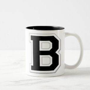 Stava det ut den initiala svart kaffemuggen för Två-Tonad mugg