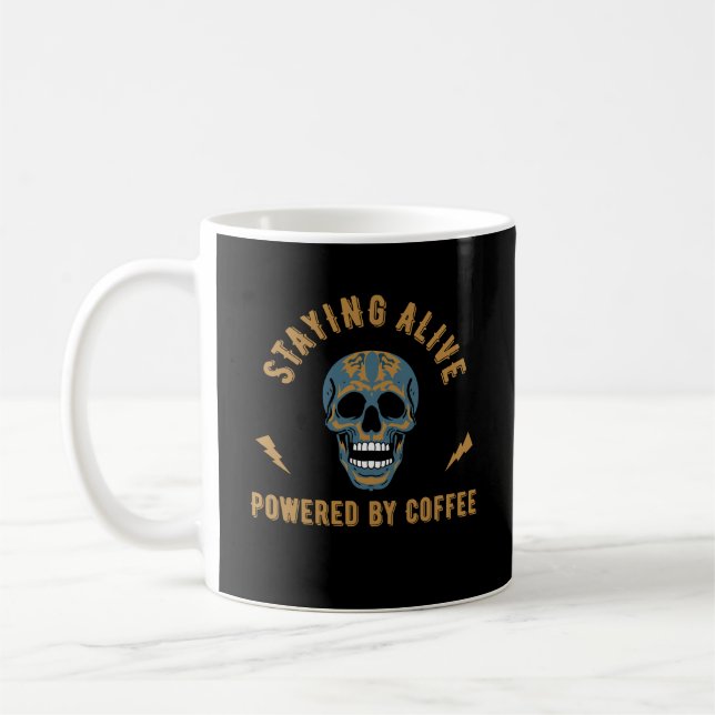 Staying alive powered by coffee - skull energy  kaffemugg (Vänster)