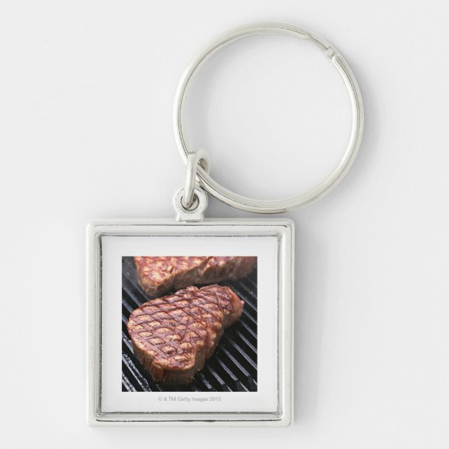 Steak 2 fyrkantig silverfärgad nyckelring (Framsidan)