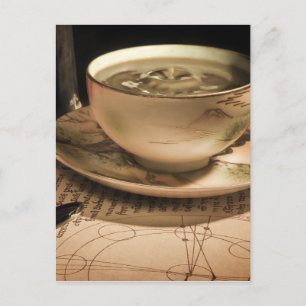 Steampunk-kaffekopp på fat med fickur vykort