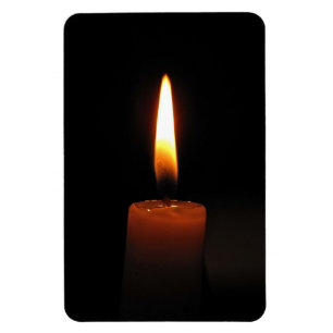 Stearinljuset flammar magnet