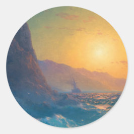 Steep rocky coast and a rough sea at sunset runt klistermärke