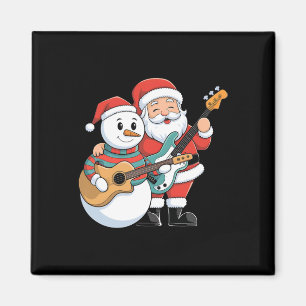 Sten Guitar Snögubbe och Jultomten som spelar gita Magnet