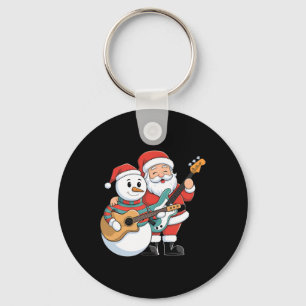 Sten Guitar Snögubbe och Jultomten som spelar gita Nyckelring