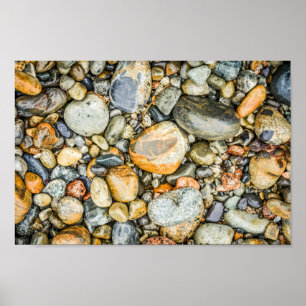 Stenar och småsten på en strand i Maine Arkivbild Poster
