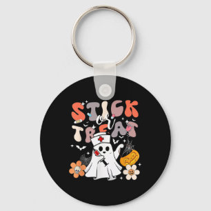 Stick eller behandla Halloween Ghost Nurse Crna Em Nyckelring