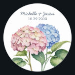 Sticker Runt Klistermärke<br><div class="desc">Capture the beauty and romance of your special day with this elegant wedding sticker. The delicate watercolor floral motif adds a touch of whimsy and sophistication to save-the-dates, invitations, favor tags, and more. Its classic round shape makes it the perfect finishing touch to elevate your wedding paper goods. Crafted with...</div>