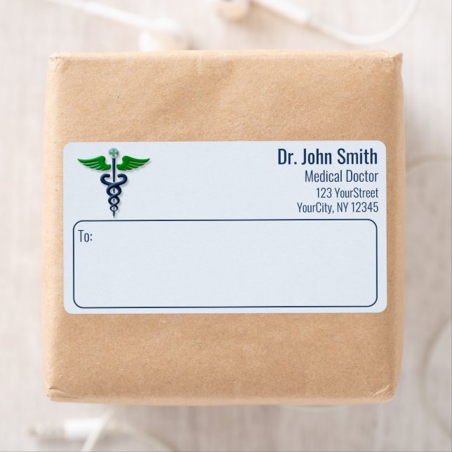 Stilfull medicinsk kaduceus gröna vingar kors blå fraktsedel (Insitu)