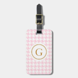 Stilfull moderiktig rosa houndstooth med bagagebricka