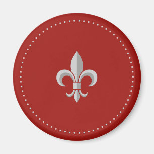 Stilfullt silver fleur-de-lis på den röda magnet