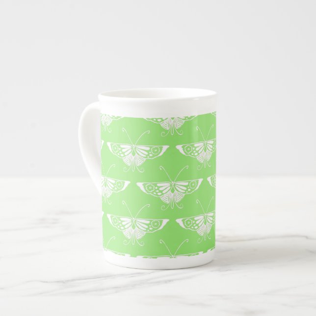 Stiliserad Deco-fjäril - kalkgrön Benporslin Mugg (Framsida vänster)