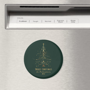 Stiliserad julgran i guld på mörk bakgrund magnet