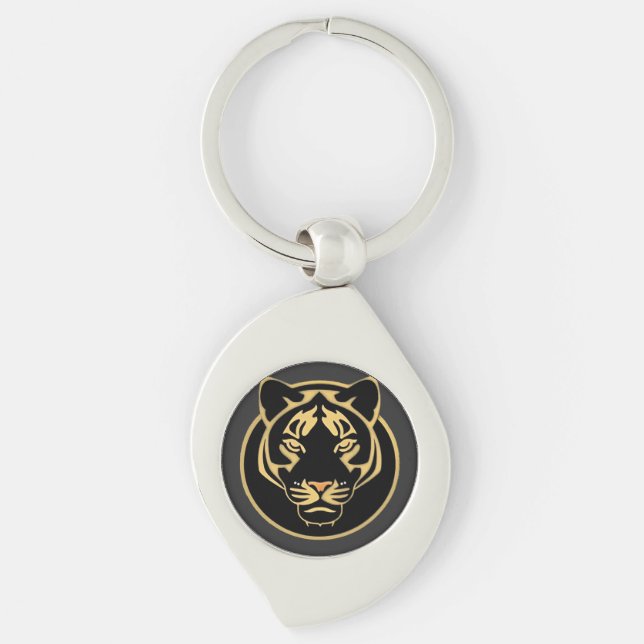 Stiliserad logodesign med gyllene tiger swirl silverfärgad nyckelring (Framsidan)