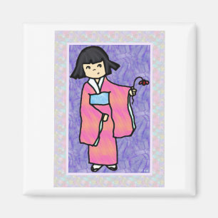 Stilla Kimi i ett Kimonoinnehav en blommamagnet Magnet