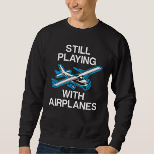 Stilla leka med flygplan lotsar gåvaflygaren lång ärmad tröja