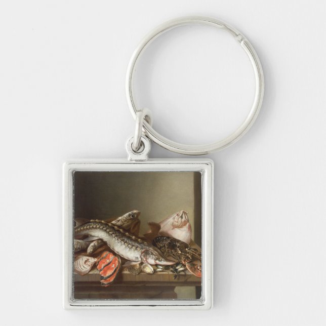 Stilleben av fisken på ett bord fyrkantig silverfärgad nyckelring (Framsidan)