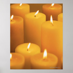 Stilleben av tände stearinljus poster