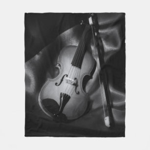 Stilleben svart-vit bild av en violin fleecefilt