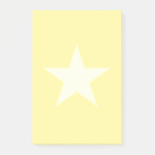 Stjärna på ljust gult post-it block