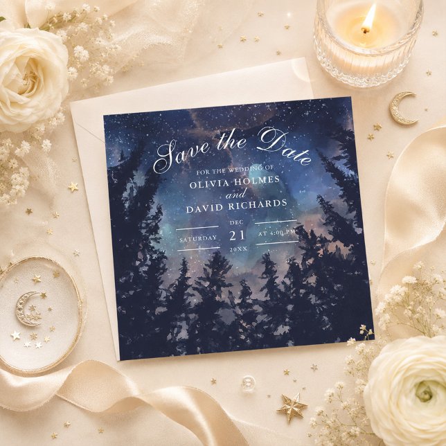 Stjärnklar Skog Save the Date för Celestiala Bröll Spara Datumet (Starry Night Forest Celestial Save the Date on a table with flowers and celestial decor)