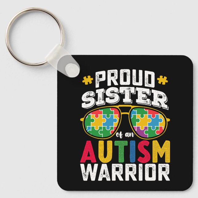 Stolt syster till en familj med en autismkrigare nyckelring (Framsida)