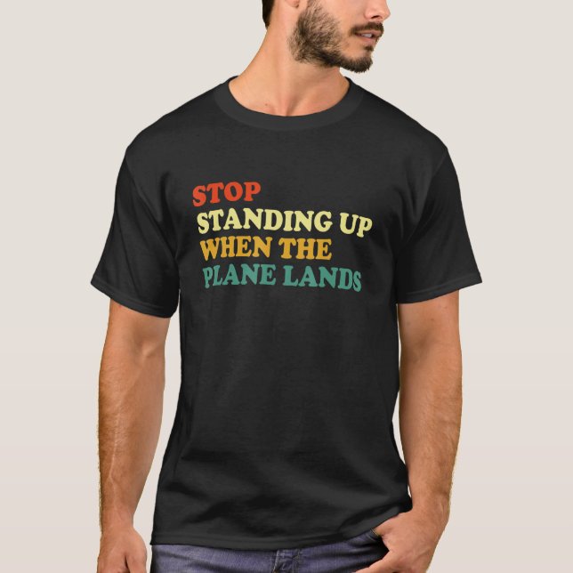Stop Standing Up When The Plane Lands T Shirt (Framsida)
