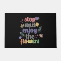 Stoppa och njut av blommorna