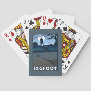 Stor fot som går till och med golfbana spel kort