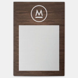 Stor inledande modern monogram på brunt trä post-it block