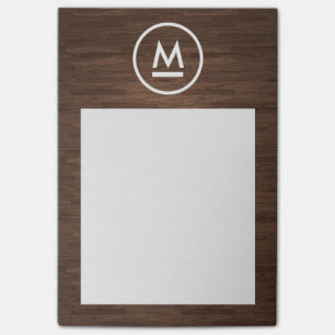 Stor inledande modern monogram på brunt trä post-it block