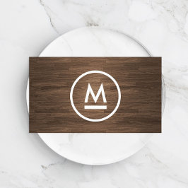 Stor inledande modern monogram på brunt trä visitkort